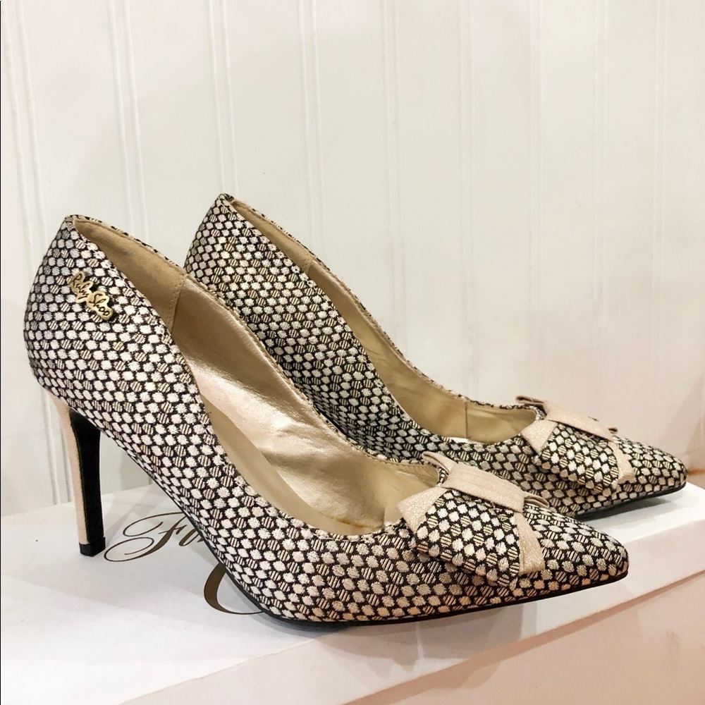 The cutest gold shimmery heels with a honeycomb like pattern and bows